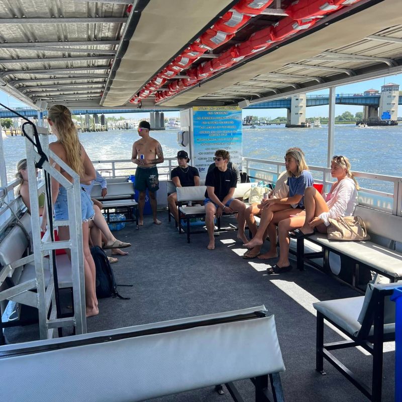 a group of people sitting at a station